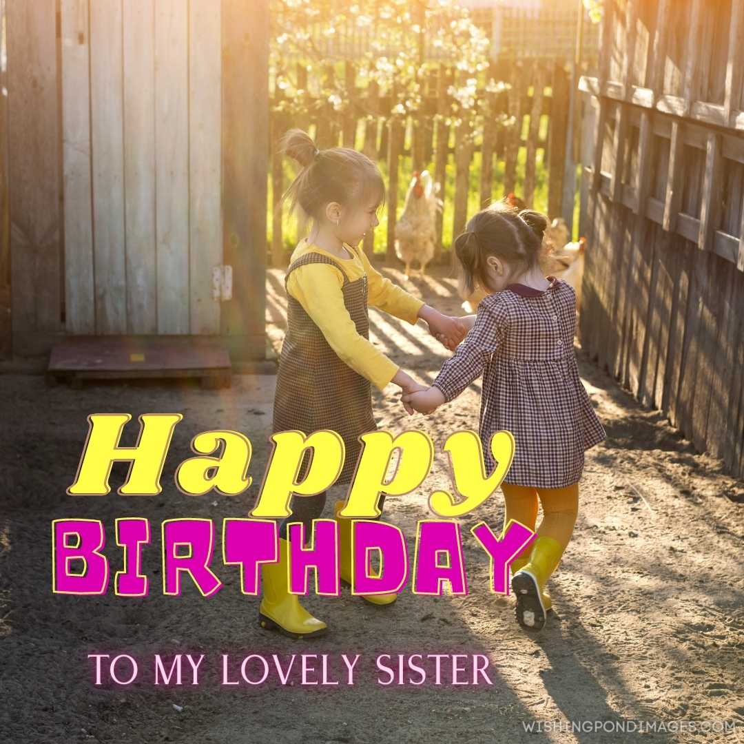 Two sisters having fun and twirling, holding hands in the backyard of the farm at sunset. Happy Birt